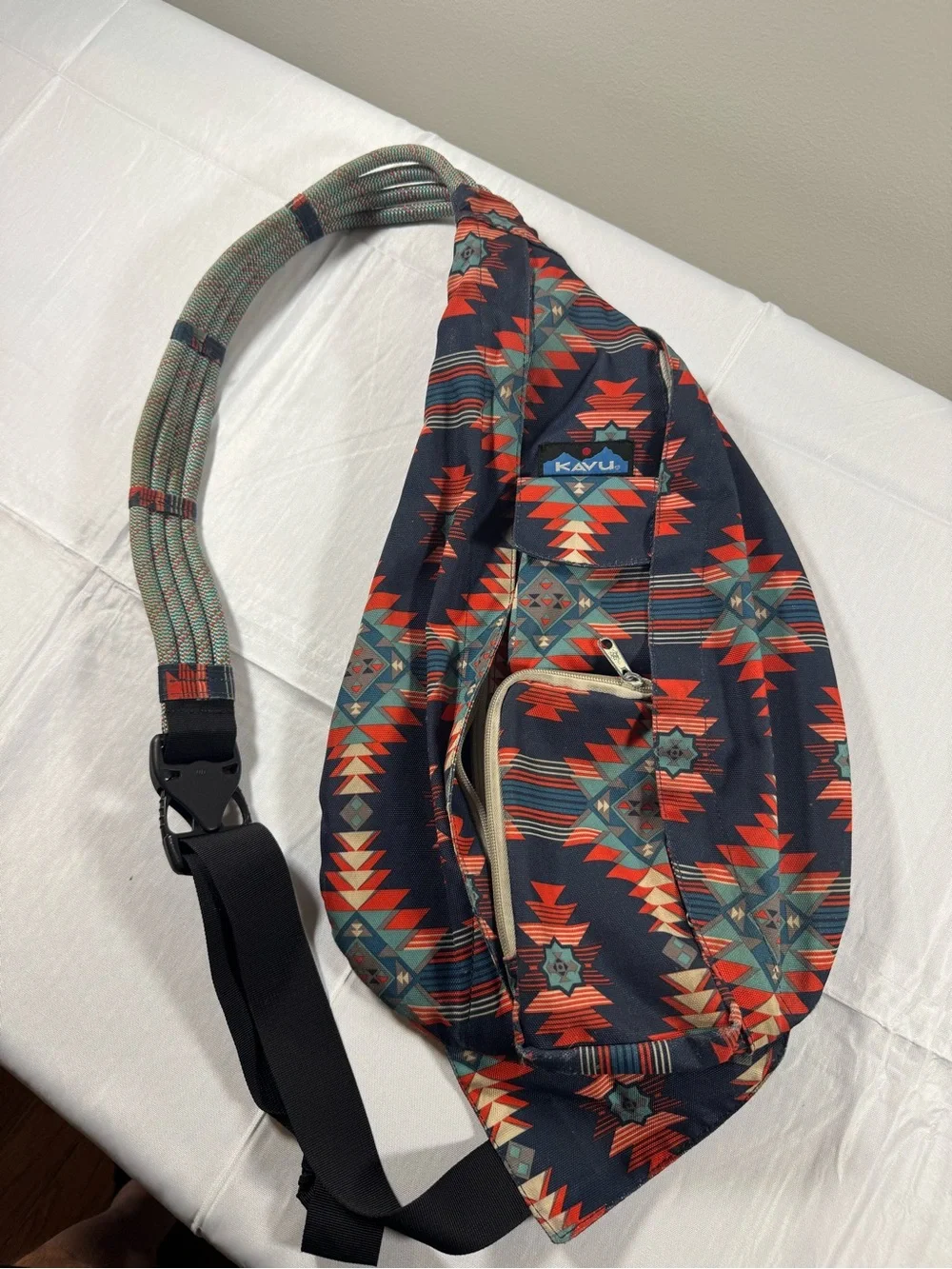 Kavu Rope Sling Bag in Navy with Red & Teal Pattern